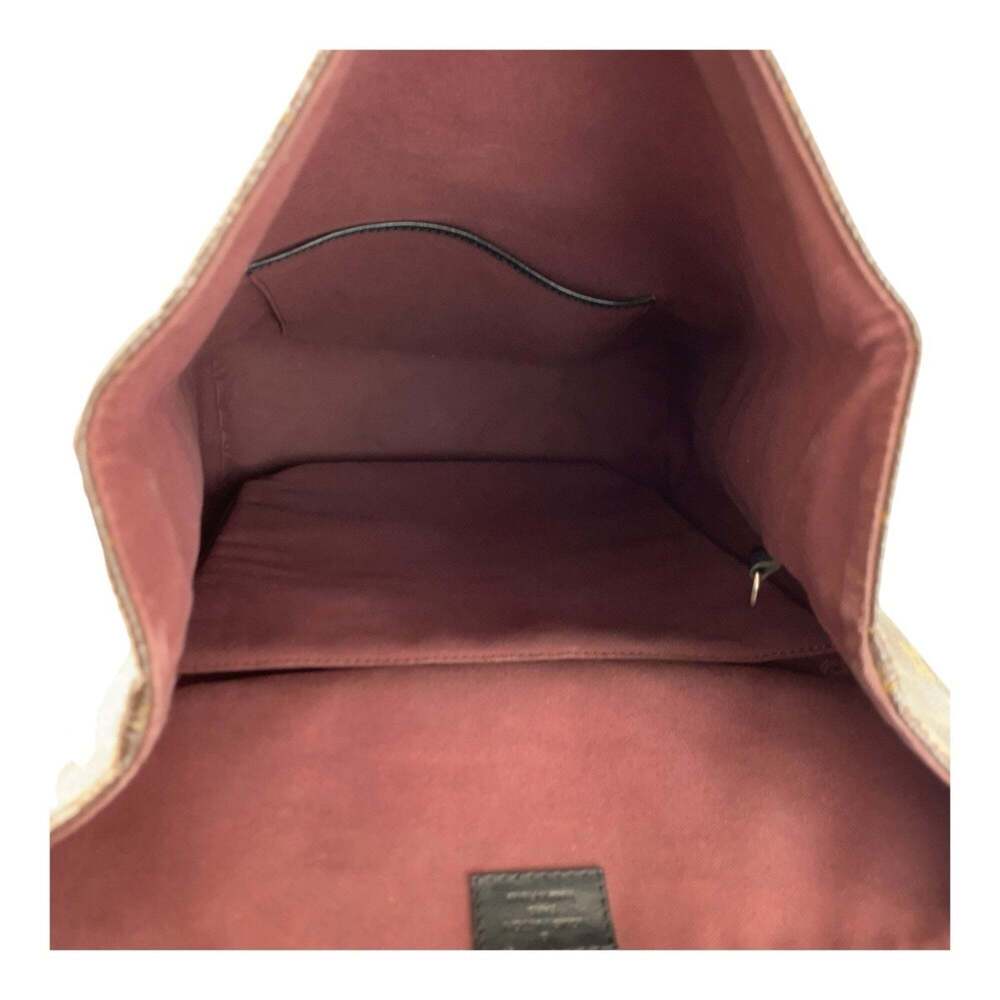 LOUIS VUITTON Black Monogram Leather Backpack - Picture 10 of 10